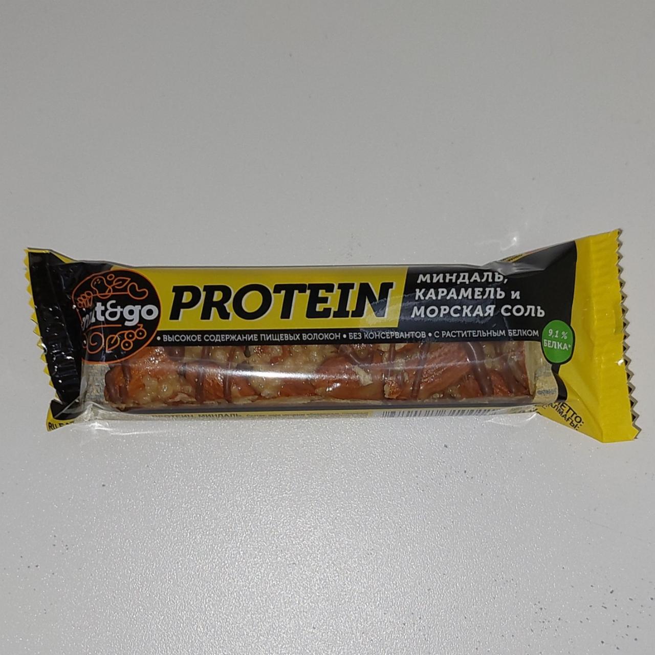 Фото - Протеиновый батончик ореховый protein миндаль, карамель и морская соль Nut&go