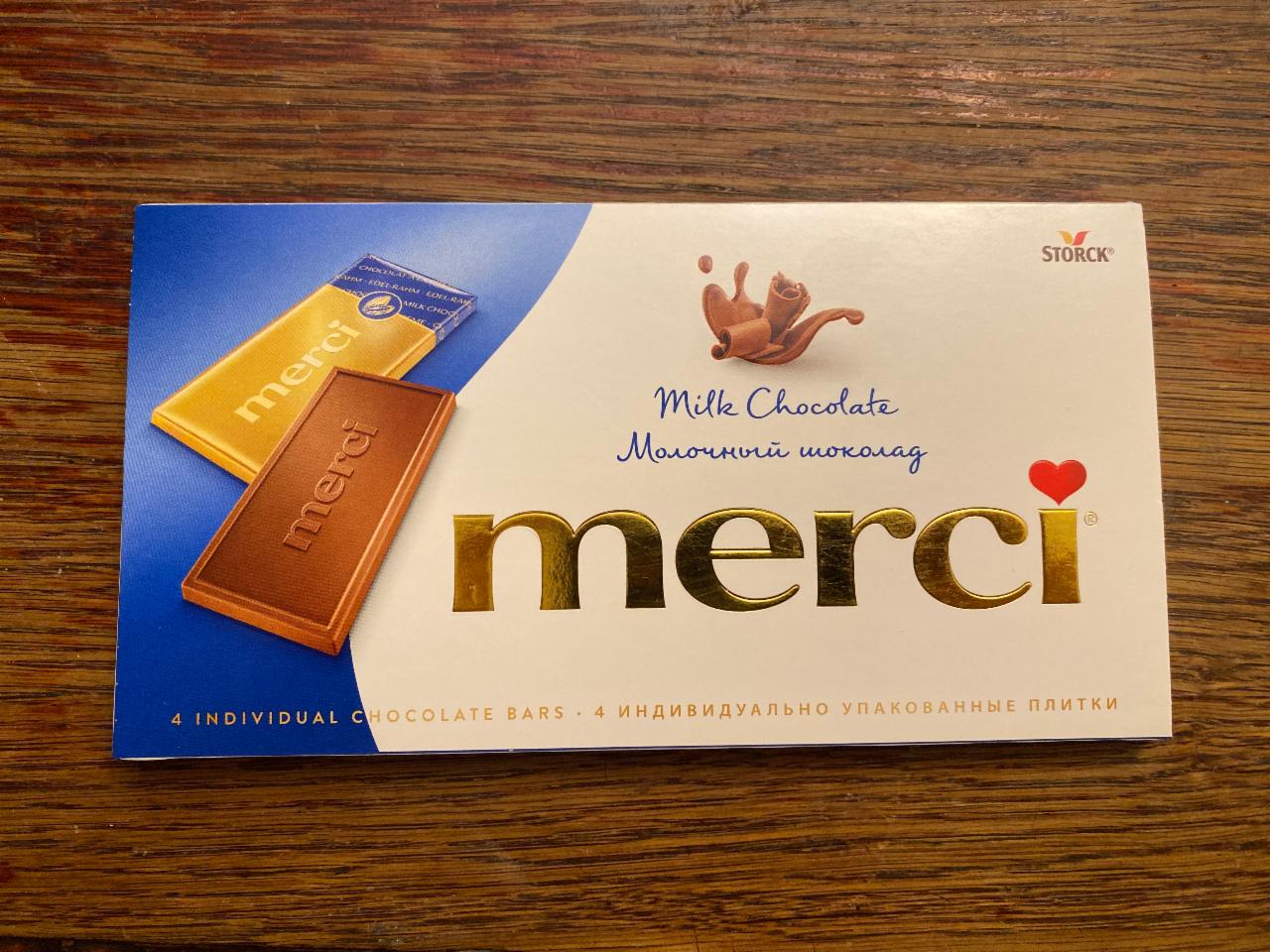 Фото - Шоколад Merci milk chocolate 4 индивидуально упакованные плитки Storck