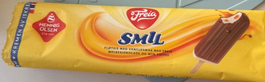 Фото - Smil fløteis med vaniljesmak, melkesjokoladebiter og myk toffee Freia