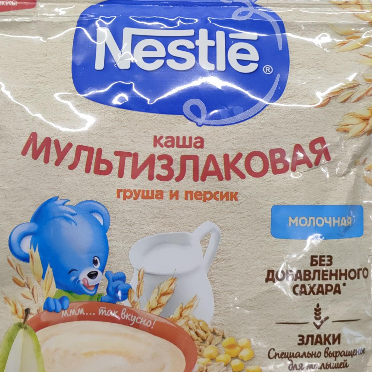 Фото - Каша мультизлаковая груша и персик Nestlé