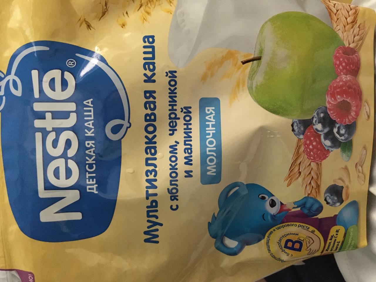 Фото - детская каша nestle мультизлаковая с яблоком, черникой и малиной Nestle