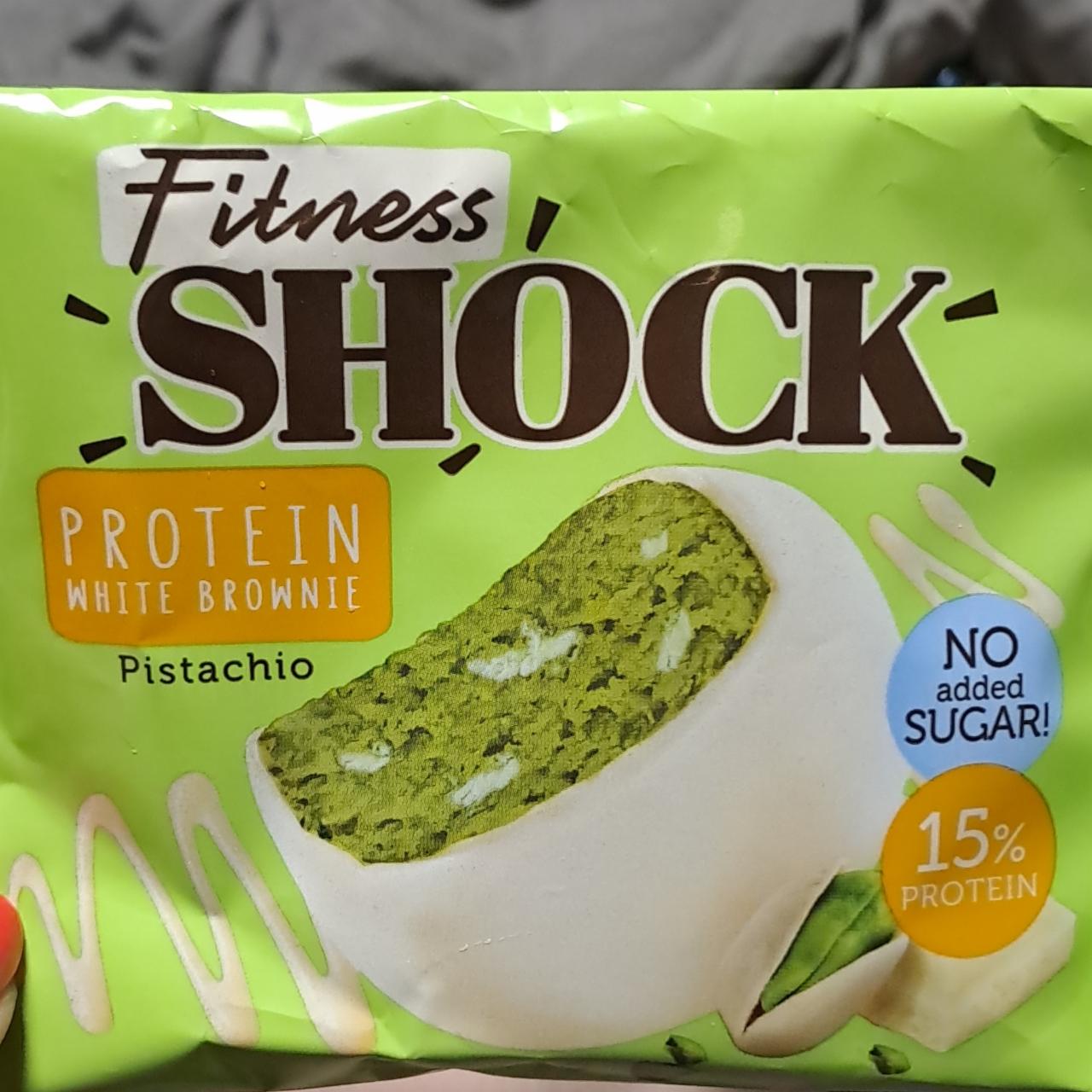 Фото - Протеиновый десерт белый брауни фисташковый protein white brownie Fitness shock