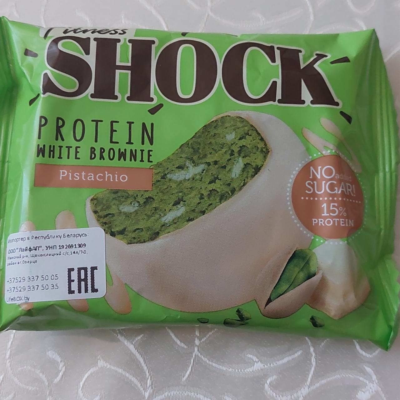 Фото - Протеиновый десерт белый брауни фисташковый protein white brownie Fitness shock