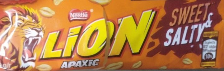 Фото - Батончик шоколадный с арахисом Lion Nestle