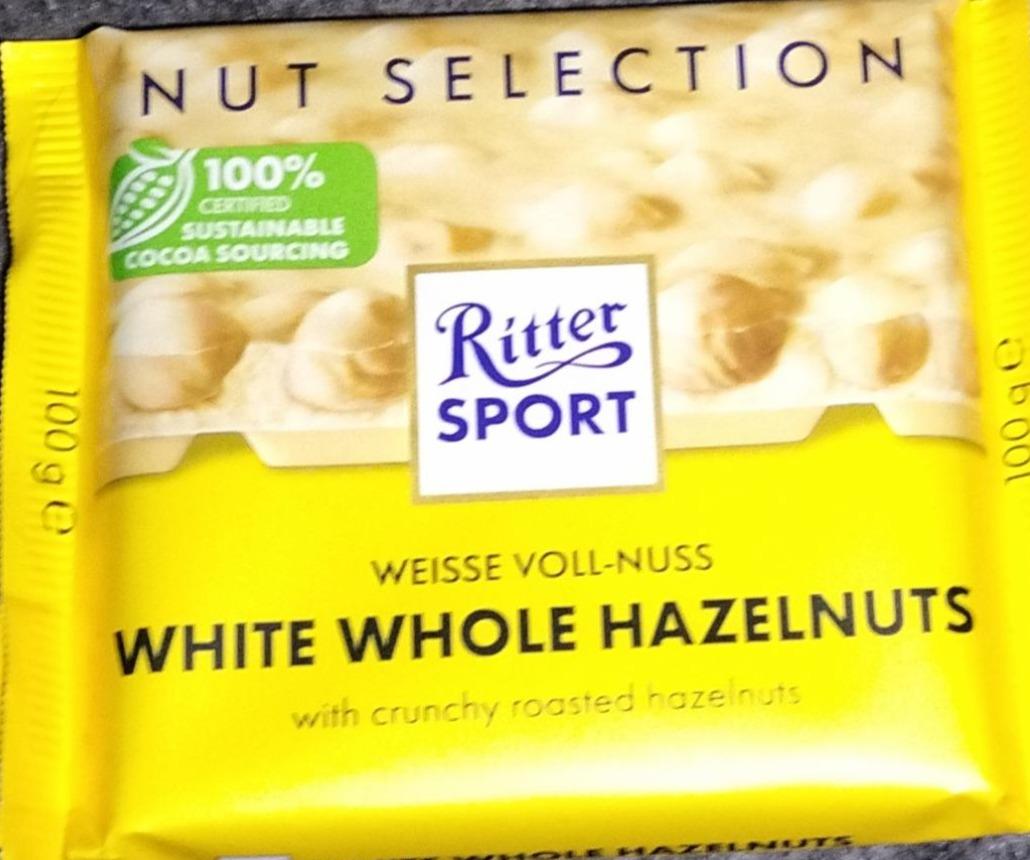 Фото - White whole hazelnuts with crunchy roasted hazelnuts Ritter Sport