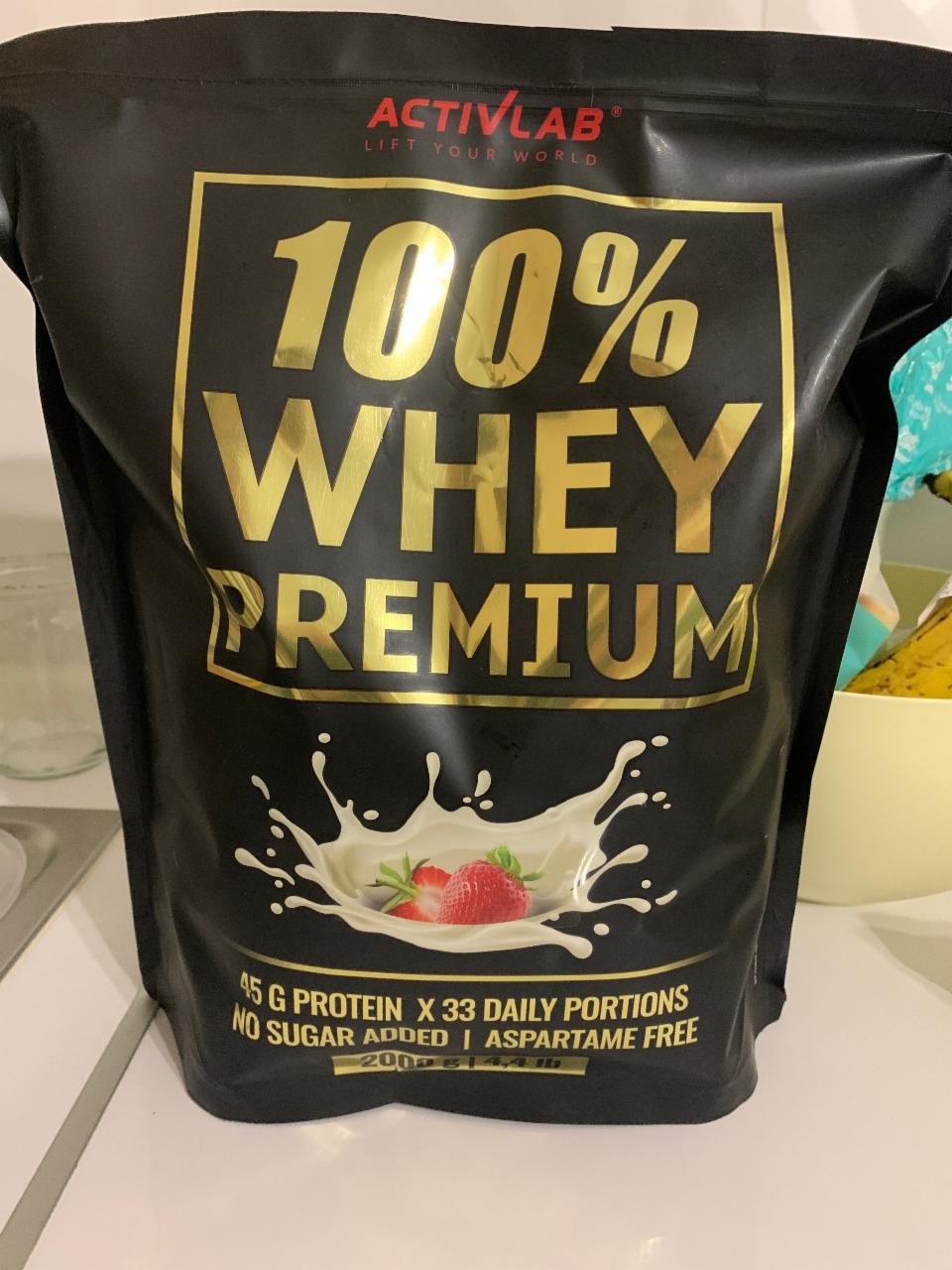 Фото - 100% Whey Premium protein jahoda ActivLab